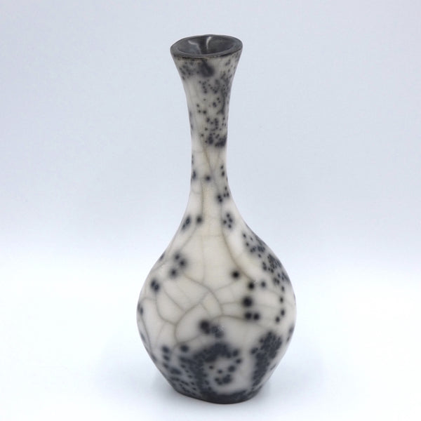 Raku fired narrow necked vase by artist Helen Rondell