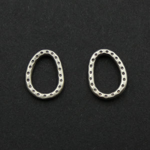 Dotted hoop studs by jeweller Helen Shere