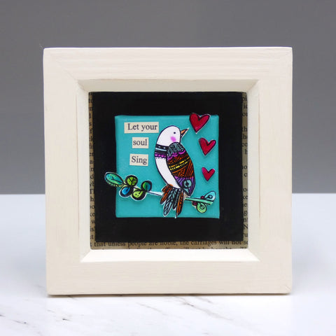 Miniature mixed media collage of a bird and flowers by artist Catherine Hoskin