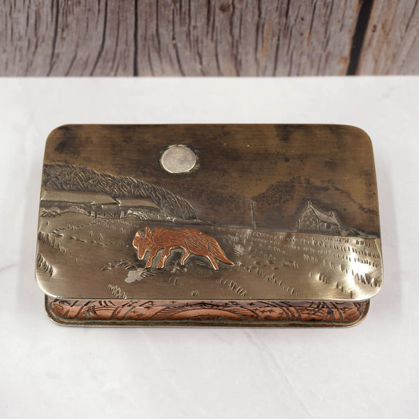 Metal hinged box featuring a fox under the full moon by artist Cornelius Jakob Van Dop