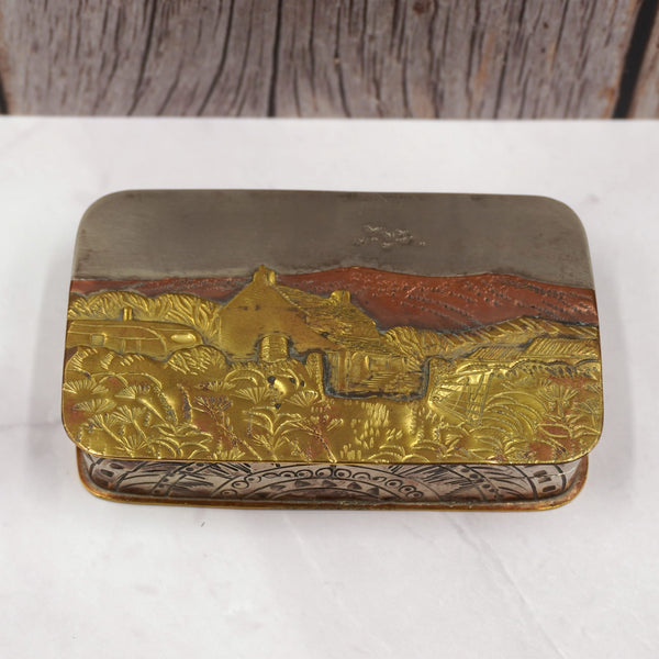 Metal hinged box depicting birds flying over a farmhouse in the heat of the summer by artist Cornelius Jakob Van Dop