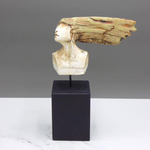 Earthenware 'stick head' sculpture on a wooden base by artist Christy Keeney