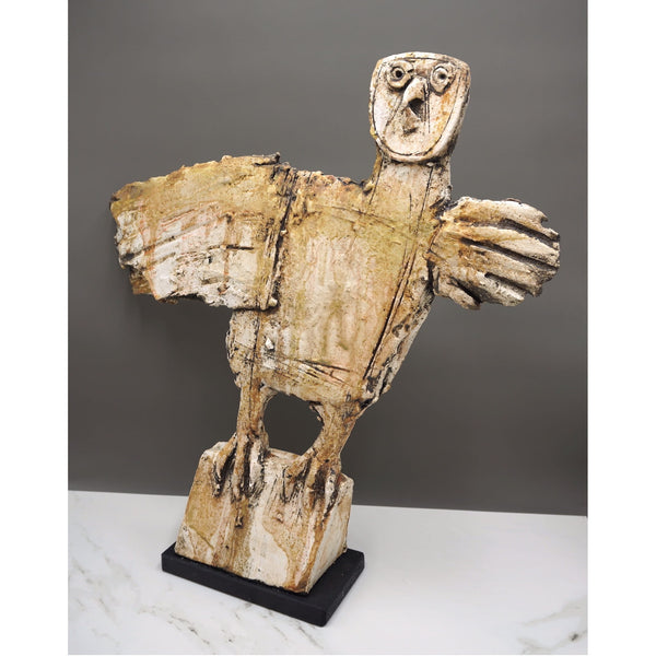 Earthenware sculpture of an owl by artist Christy Keeney