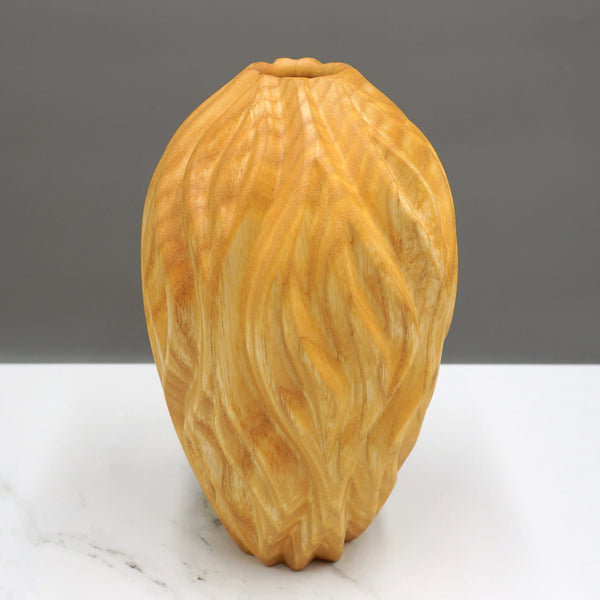 Carved ash vase by woodturner Howard Moody