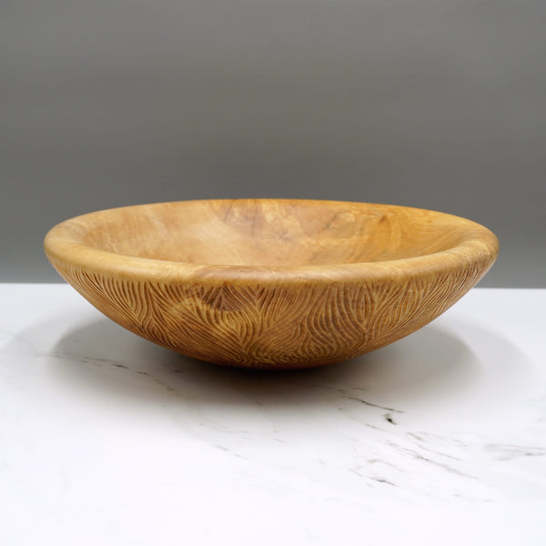 Carved holly bowl by woodturner Howard Moody
