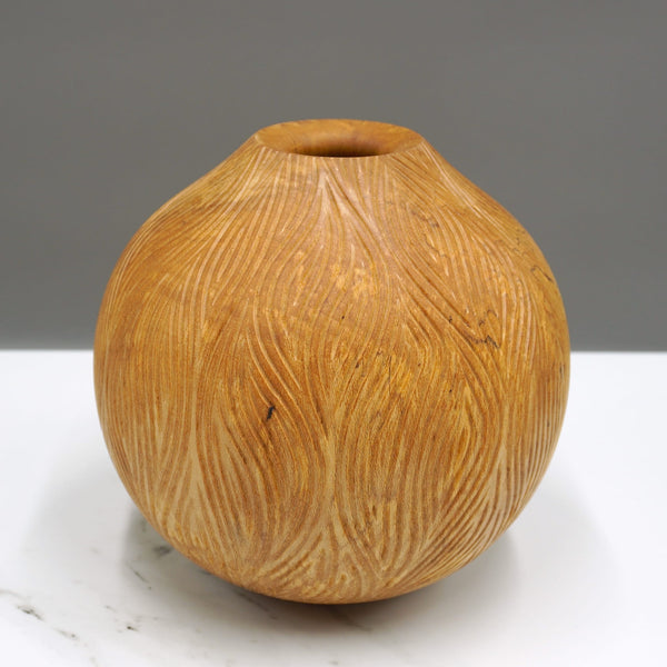 Carved holly vase by woodturner Howard Moody