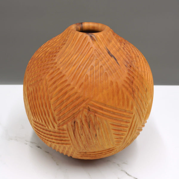 Carved lime vase by woodturner Howard Moody