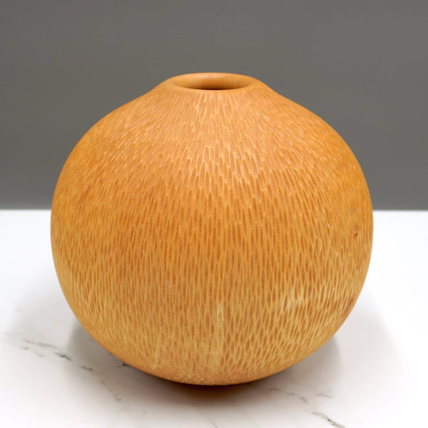 Carved sycamore vase by woodturner Howard Moody