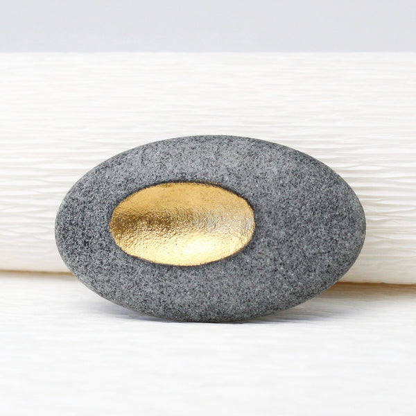 Pebble brooch by jewellers John and Dawn Field 