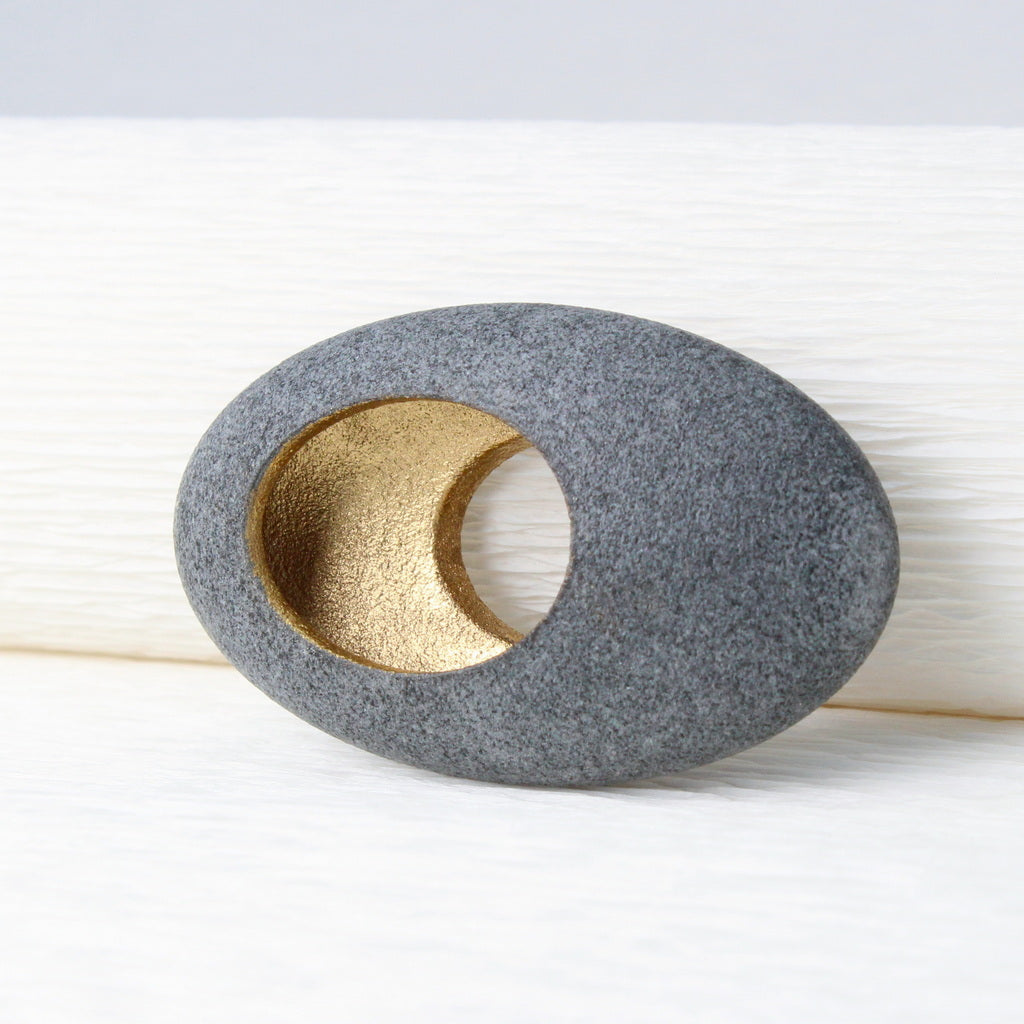 Hollow pebble brooch by jewellers John and Dawn Field 