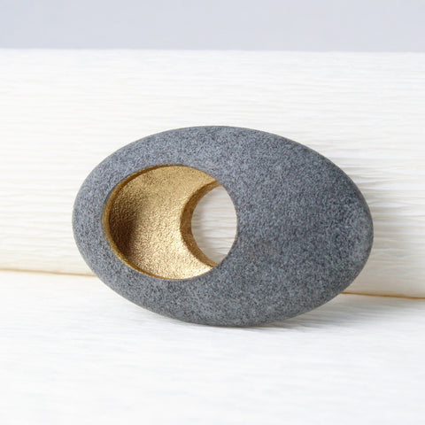 Hollow pebble brooch by jewellers John and Dawn Field 