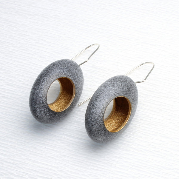 Hollow pebble earrings by jewellers John and Dawn Field 