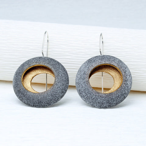 Round pebble earrings by jewellers John and Dawn Field