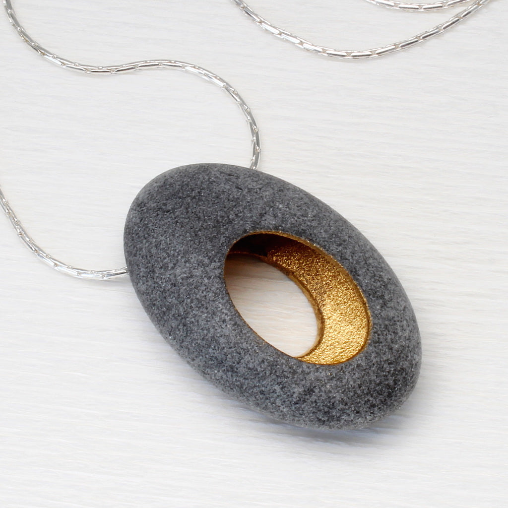 Hollow pebble pendant by jewellers John and Dawn Field