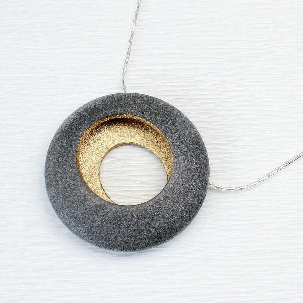 Round pebble pendant by jewellers John and Dawn Field