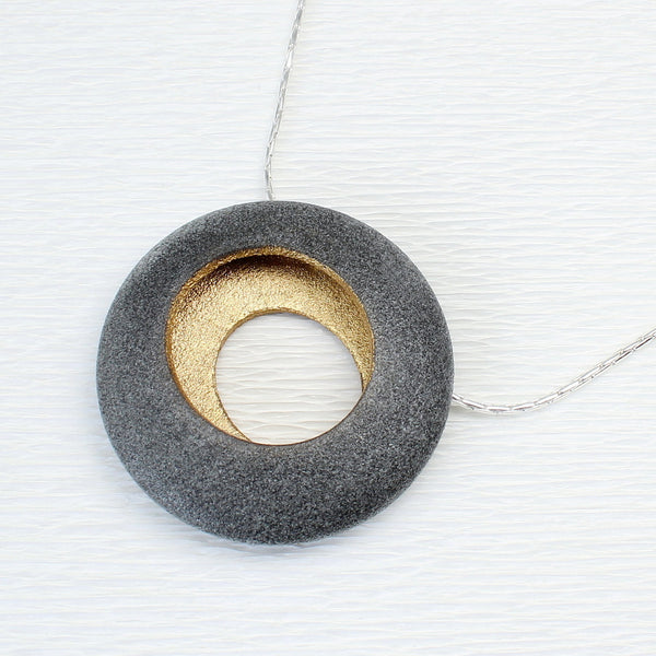 Round pebble pendant by jewellers John and Dawn Field