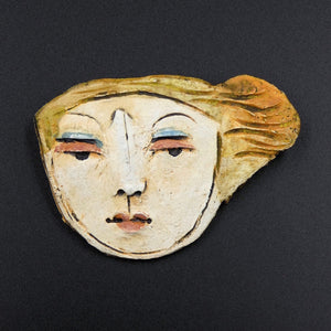 Handmade ceramic brooch by artist Christy Keeney