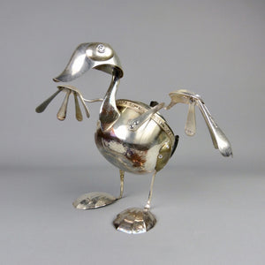 Duck sculpture made from found objects including a teapot by artist Dean Patman