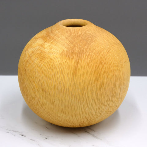 Carved sycamore vase by woodturner Howard Moody
