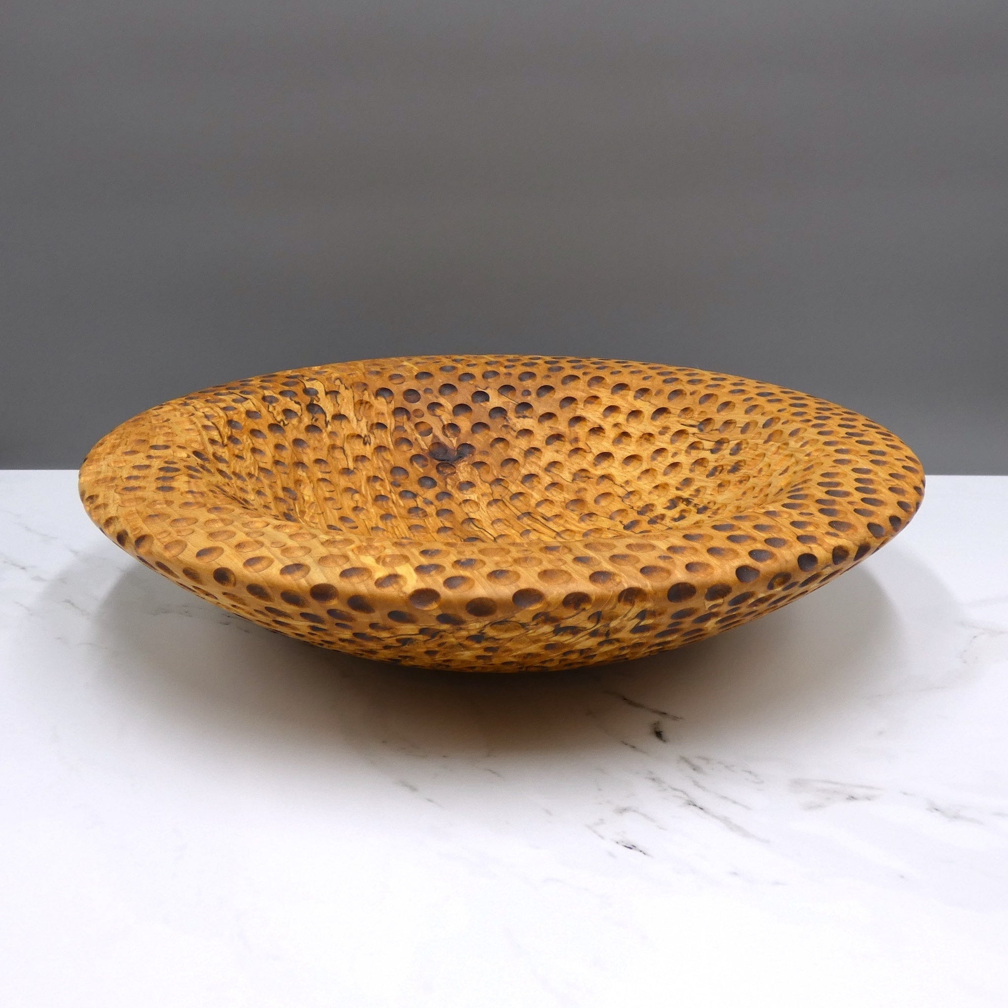 Dimpled alder bowl by woodturner Howard Moody