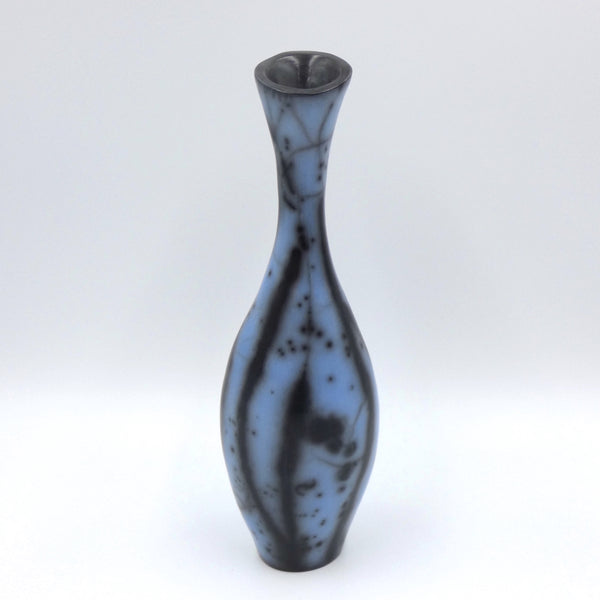 Raku fired narrow necked vase in electric blue by artist Helen Rondell