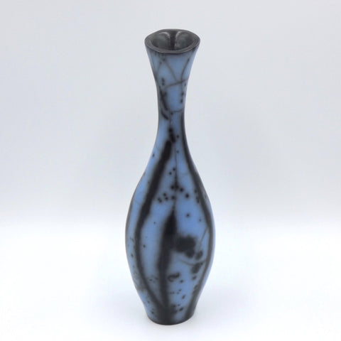Raku fired narrow necked vase in electric blue by artist Helen Rondell