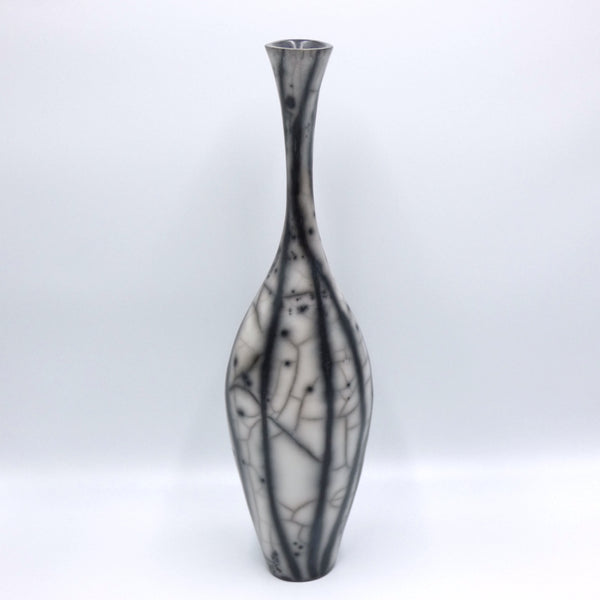 Raku fired narrow necked vase by artist Helen Rondell