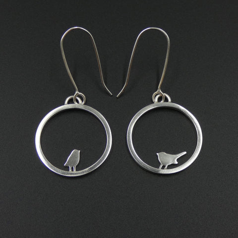Tiny bird earrings by jeweller Helen Shere