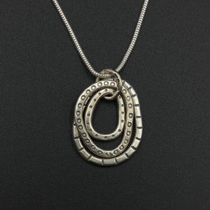 Triple hoop pendant by jeweller Helen Shere