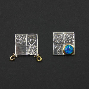 Asymmetric stud earrings by jewellers John and Dawn Field