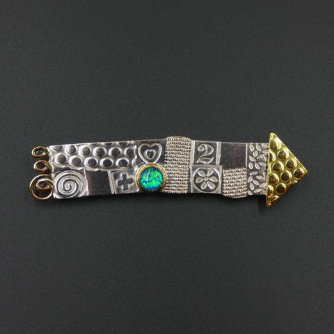 Arrow brooch by jewellers John and Dawn Field