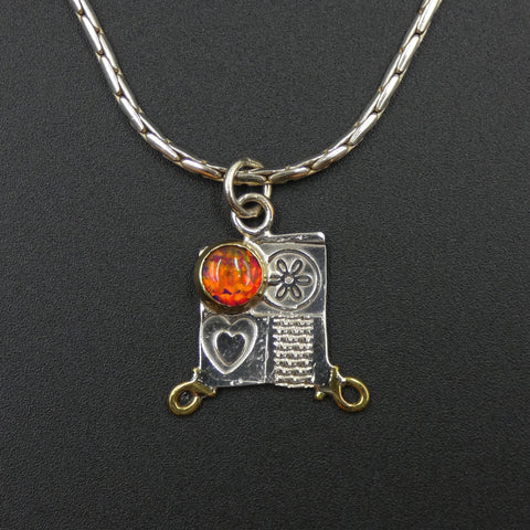 Small pendant by jewellers John and Dawn Field