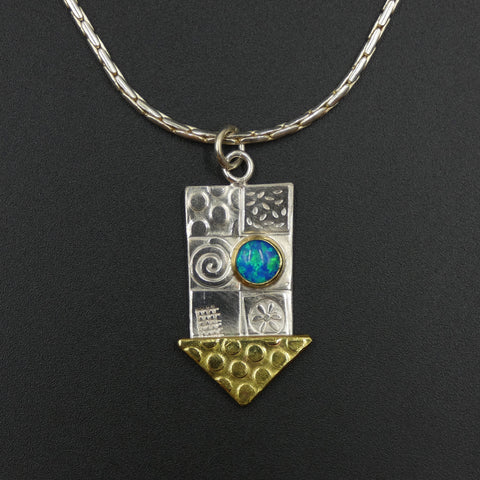 Medium pendant by jewellers John and Dawn Field
