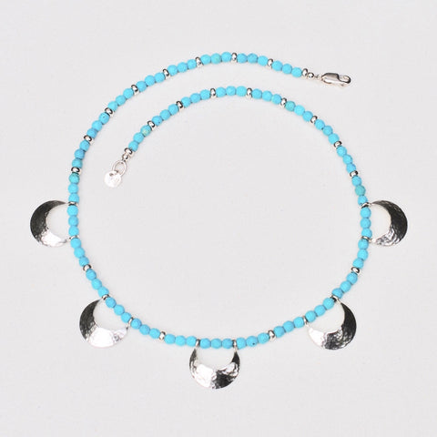 Sterling silver crescent moon necklace with turquoise beads by jeweller Kathleen Appleyard